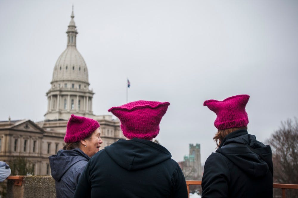 on Jan. 21, 2017 at the Capital Building in Lansing. Activists gathered and expressed their opinions.