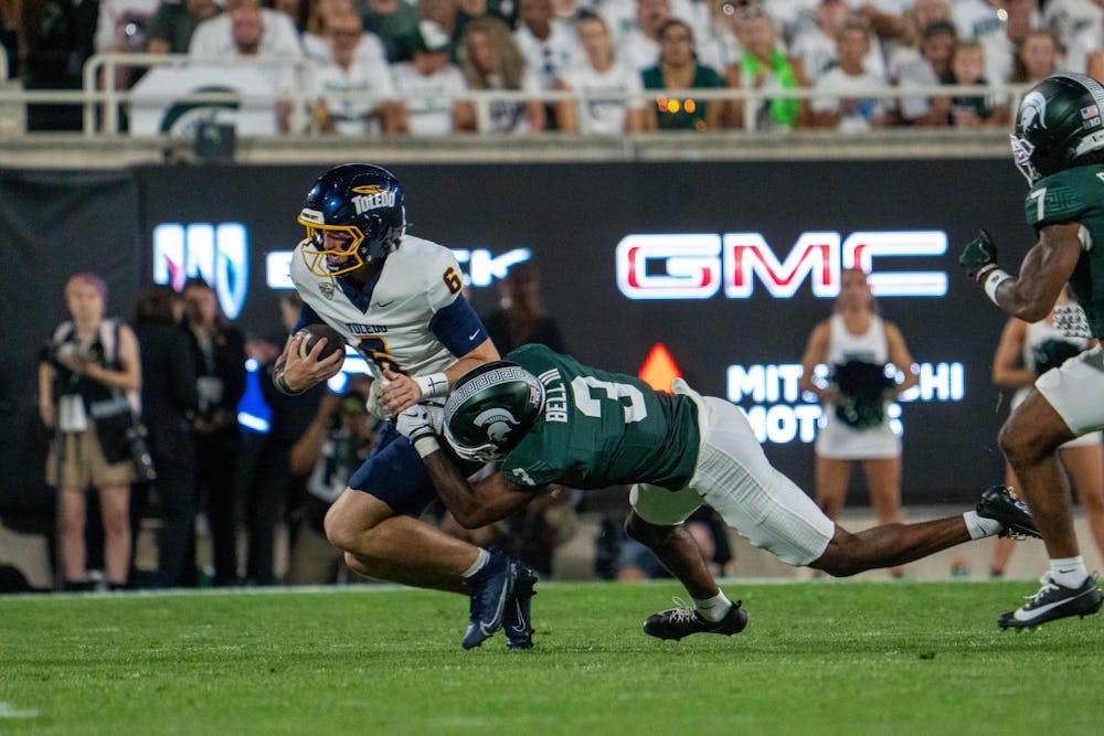 <p>Samson Gash (5) of MSU sacks Langston Long (6) of Toledo during the Michigan State vs. Toledo football game at Spartan Stadium in East Lansing, Mich., on Friday, Sept. 4, 2026.</p>