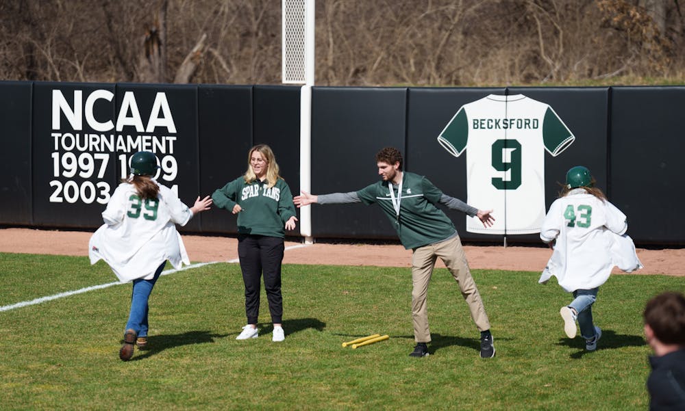 <p>In between innings Spartan fans compete in look like a Spartan challenge. Spartans lost 5-4 against Nebraska, on April 10, 2022.</p>