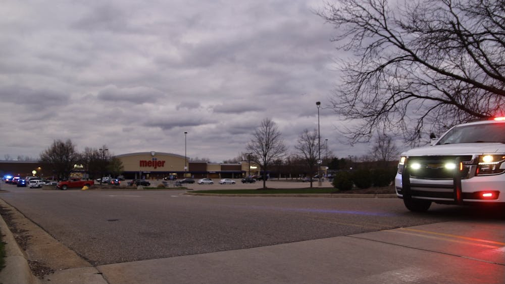 <p>East Lansing, Michigan State University and Lansing Township Police Departments block entrance to the Lake Lansing Meijer after a shooting occurred on Monday night. - April 25, 2022</p>