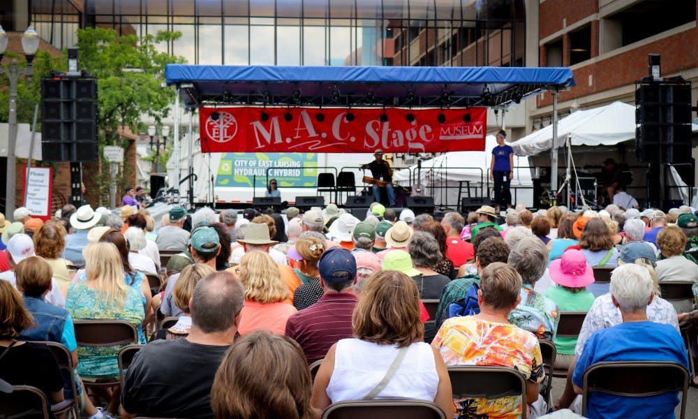 <p>The crowd is pictured during the Great Lakes Folk Festival in East Lansing on August 13. The Great Lake Folk Festival is produced by Michigan State University Museum to promote diverse music cultures.</p>
