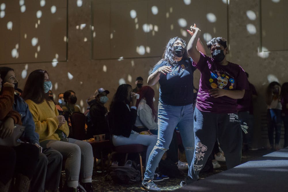<p>Attendees dancing at the Día de Los Muertos Festival at the MSU Union on Nov. 4, 2021.</p><p></p>
