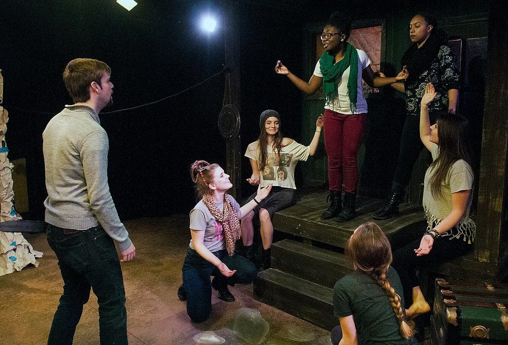 <p>Theatre seniors Casey James, left, and Adia Alli, right, rehearse MSU's latest production "The Serpent Lady" on March 14, 2014, at the Auditorium.  This play consists of improvisation, which the actors said they enjoy having the freedom to add their own personal touch to the performance. Allison Brooks/The State News</p>