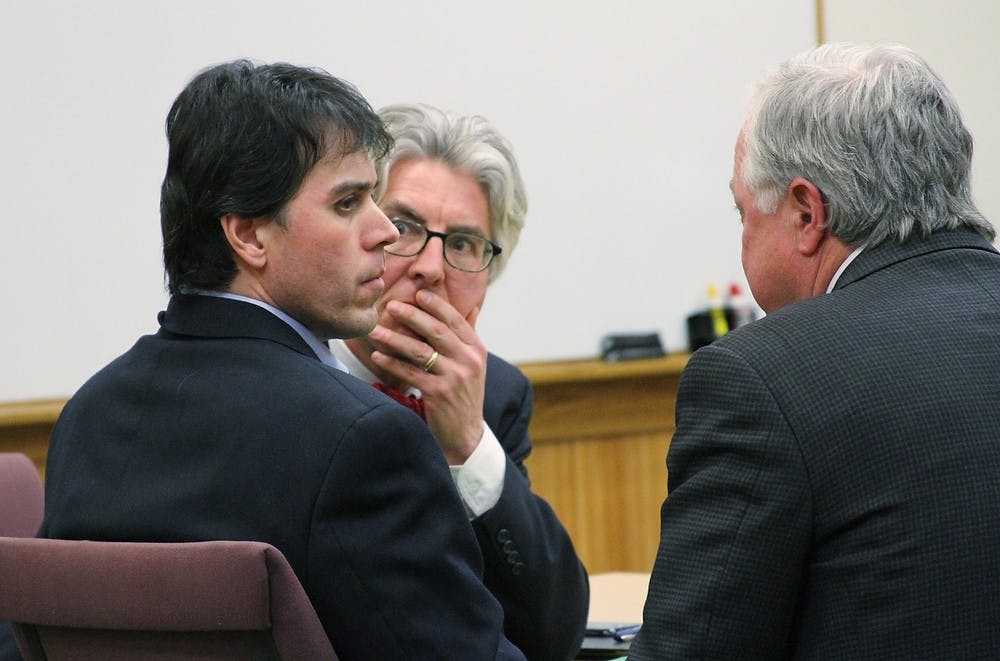 	<p>Defense attorneys Charles Groh, center, and Douglas Mullkoff speak quietly to Raulie Wayne Casteel, who shows little emotion after a 12-member Livingston County jury convicted him of terrorism on Wednesday, Jan. 29, 2014, for shooting at 23 motorists along the Interstate 96 corridor in October 2012. Lisa Roose-Church/AP Photo/Livingston County Daily Press &amp; Argus</p>