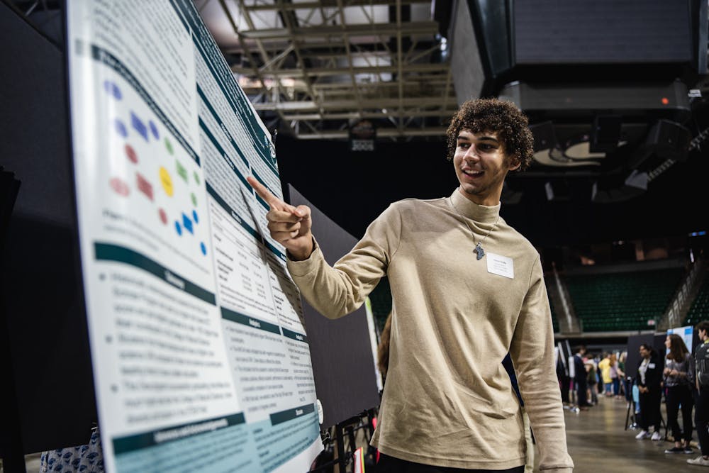 <p>Student researchers gather and present at the UURAF conference at the Breslin Center on Apr. 14, 2023.</p>
