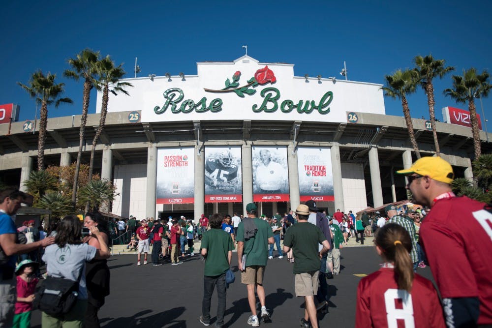 	<p>Attendees enter the Rose Bowl for the <span class="caps">MSU</span> vs. Stanford game Jan. 1, 2014, in Pasadena, Calif. The Spartans claimed Rose Bowl victory. Julia Nagy/The State News</p>