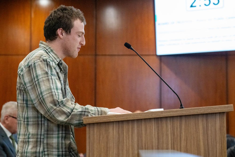 Michigan State University Senior and social relations/policy student,Henry Jerred speaks to the board for public comment during the MSU Board of Trustees at Hannah Administration Building in East Lansing, Michigan on Friday, Dec. 12, 2025. 