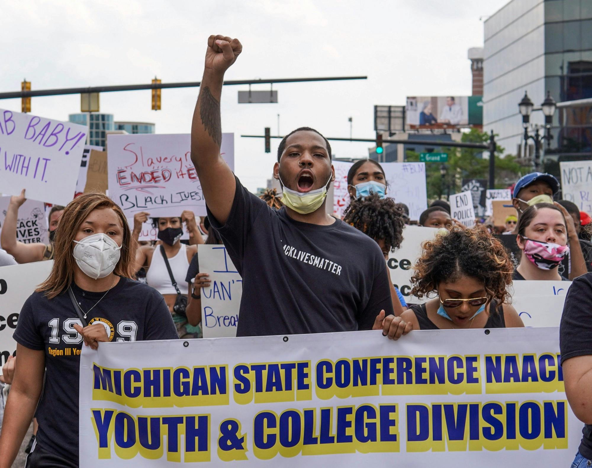 <p>Protesters begin marching during the &quot;We Are Done Dying&quot; protest held by the Michigan NAACP Youth and College Division at the Michigan State Capitol on June 10, 2020.</p>