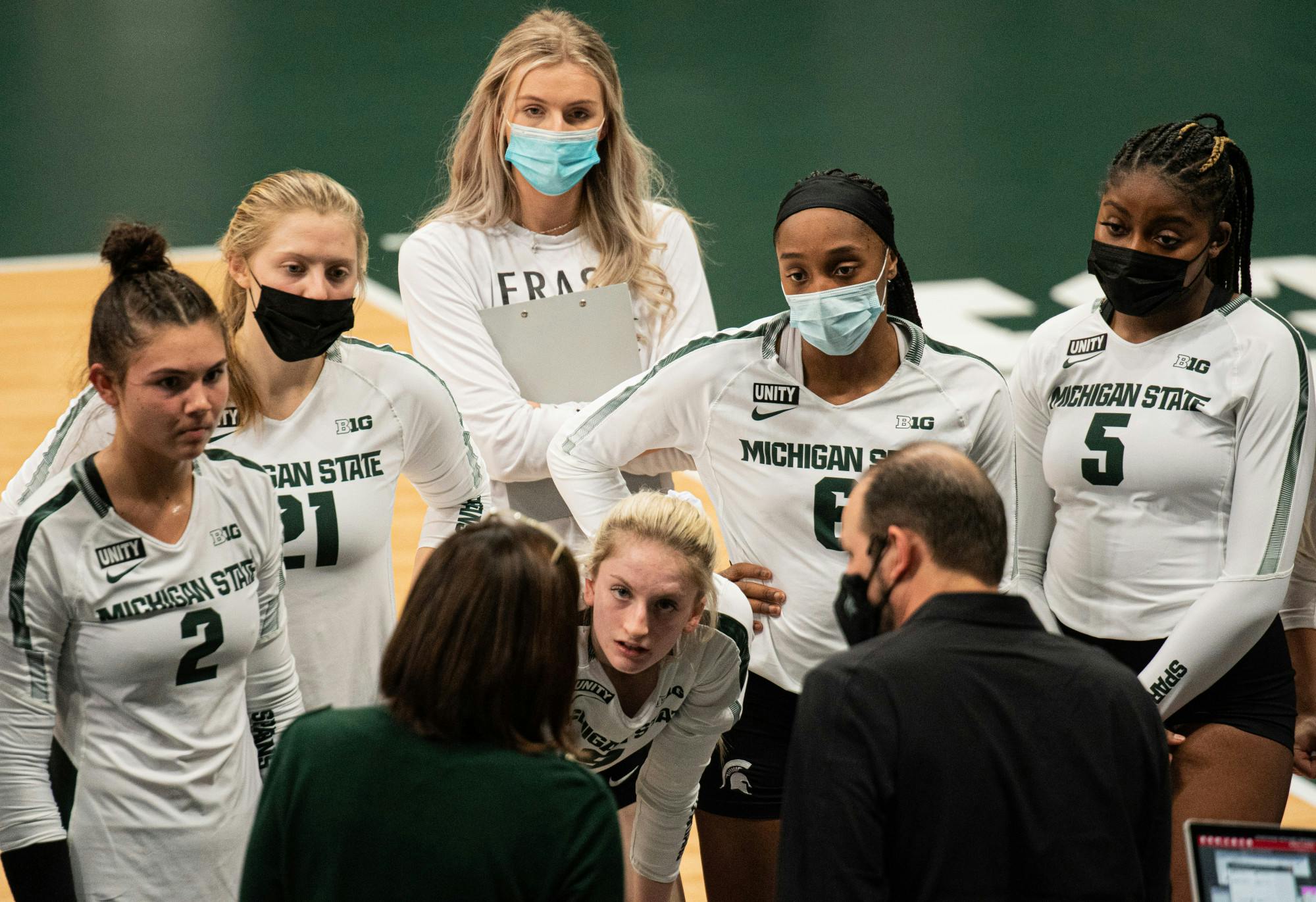 Michigan State volleyball coach Cathy George talks to her team during a timeout against Ohio State on Jan. 31, 2021. The Spartans dropped the home game at Jenison Field House in three sets.