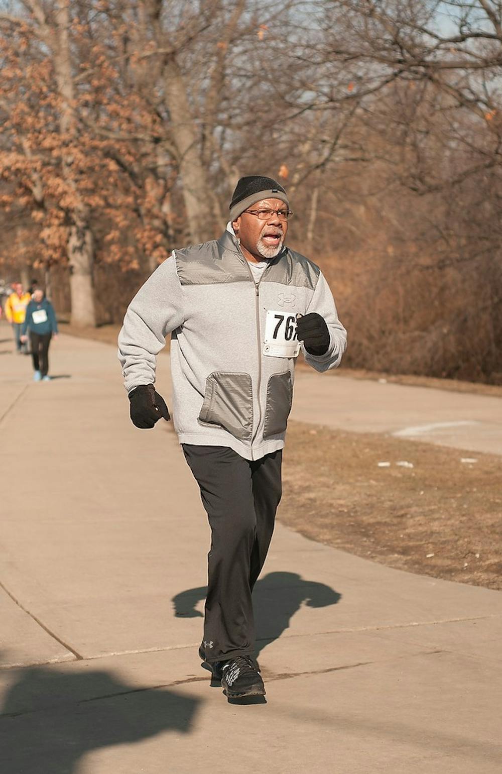 <p>Midland resident and MSU alumnus Robert Lincoln runs Mar. 15, 2015, during the 2015 Lucky Feet 5k Kidney Run/Walk that began at 542 Auditorium Rd. Lincoln plans to run a 5k every weekend for the entirety of this upcoming summer. Alice Kole/The State News</p>