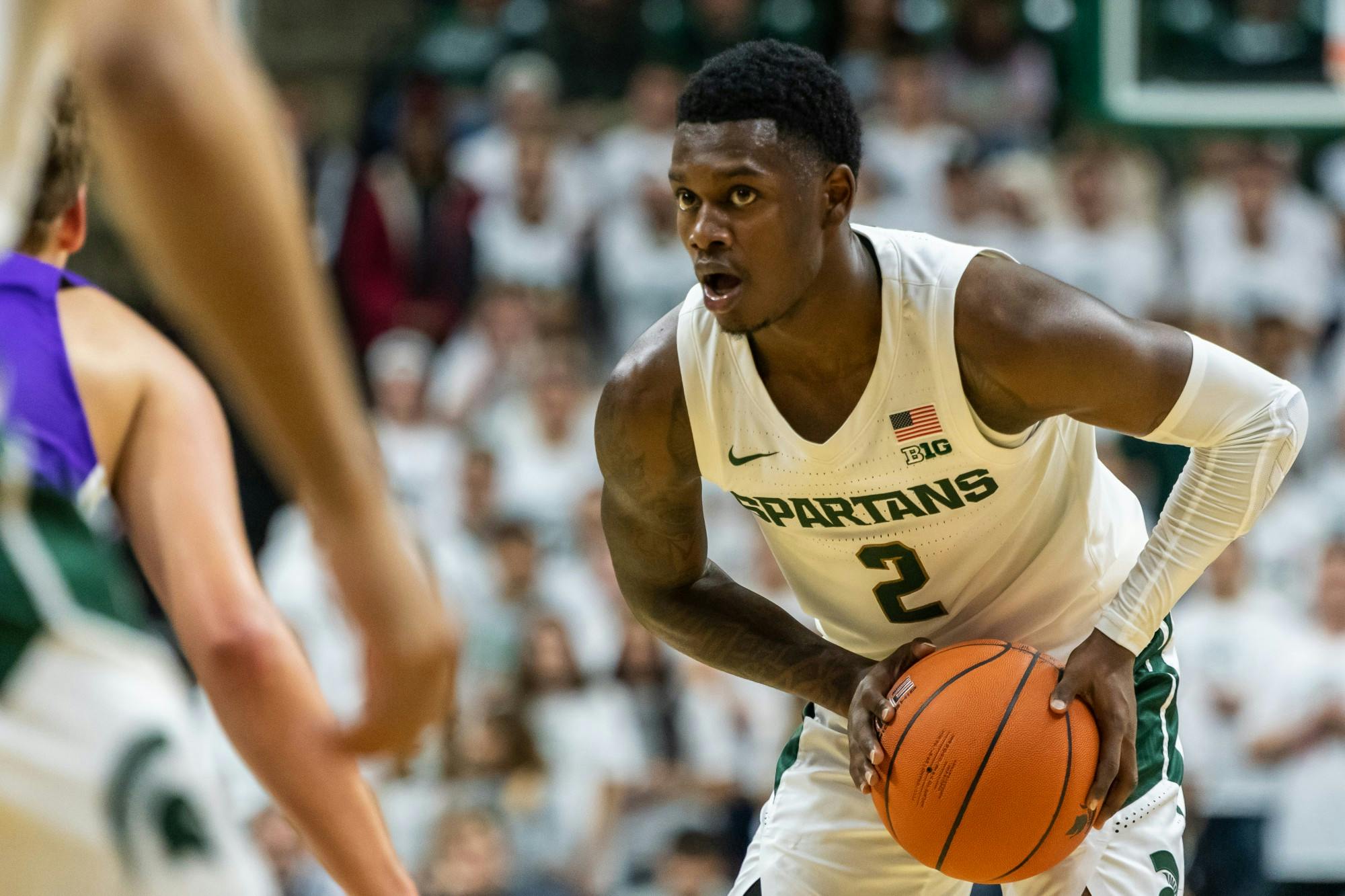 <p>Freshman guard Rocket Watts eyes up the Albion defense. The Spartans lead the Britons, 40-25, at half on Oct. 29, 2019 at the Breslin Student Events Center.</p>