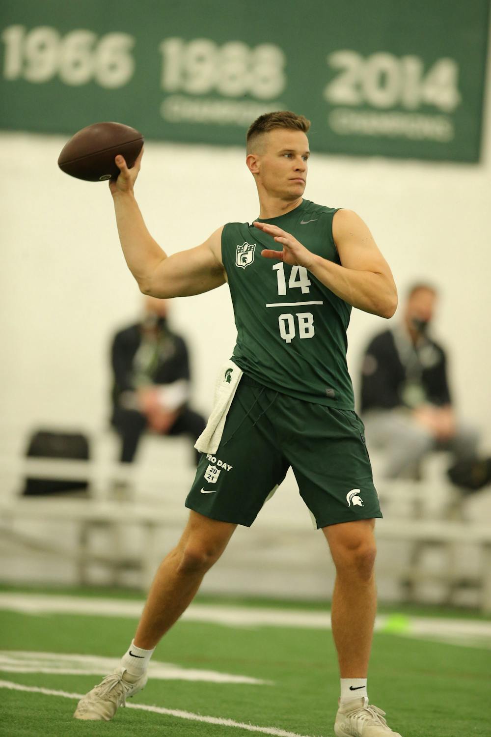 Brian Lewerke throws during a drill on March 24, 2021 at MSU Football's indoor practice facility. Lewerke left the program for the NFL following the conclusion of the 2019-20 season and played for the New England Patriots during his first season in the NFL.