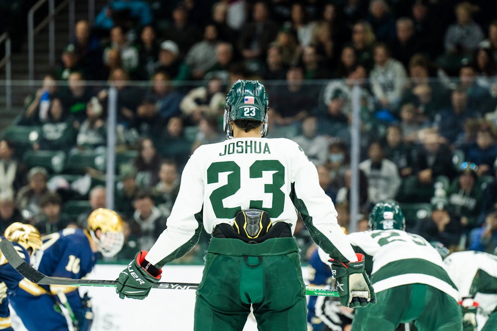 <p>Senior forward Jagger Joshua #23 braces for a showdown between his fellow Spartans and opposing Fighting Irish as the puck drops on Feb. 4, 2023.</p>