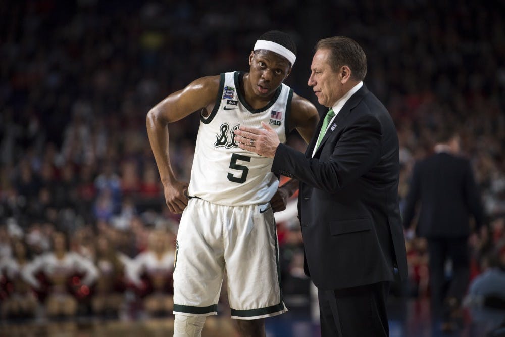 Junior guard Cassius Winston (5) talks with Michigan State head coach Tom Izzo during the second half of the NCAA Final Four game against Texas Tech at U.S. Bank Stadium in Minneapolis on April 6, 2019. The Spartans lost to the Red Raiders 61-51.  (Nic Antaya/The State News)