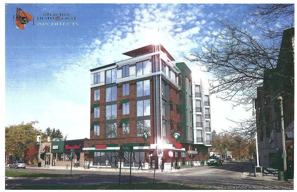 <p>Rendering of the proposed five-story building on the site of the former Taco Bell building at 565 E. Grand River Ave. The mixed-use building would feature mostly one to three-bedroom apartments, with space for commercial use available on the first floor. Rendering courtesy of Cron Management LLC.</p>