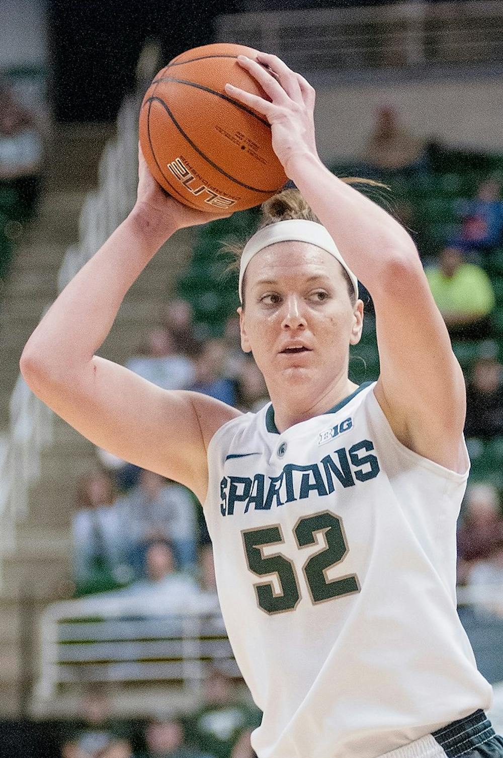 	<p>Sophomore forward Becca Mills goes to pass the ball to a teammate during the game against Penn State on Jan. 6, 2013, at Breslin Center. Mills was the leading scorer for the Spartans with a total of 17 points. Natalie Kolb/The State News</p>