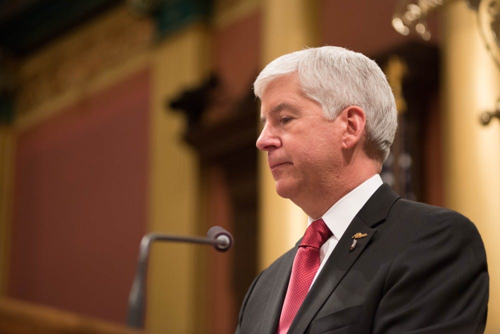 <p>Michigan Gov. Rick Snyder addresses the audience on Jan. 19, 2016 during the State of the State Address at the Capitol in Lansing, Michigan.</p>