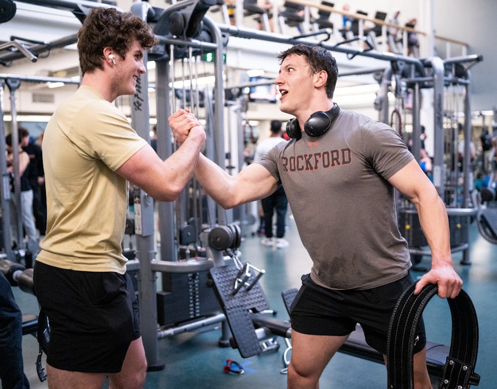 <p>Finance sophomore Chase Klimczak and sophomore Luke Watkins work out together on a "daily basis" at IM West on Feb. 28, 2023. </p>