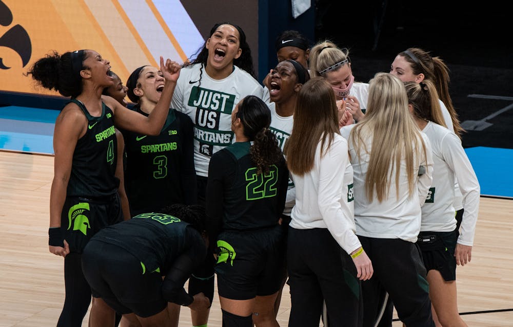 The team chants together before their game against Iowa. The Spartans fell to the Hawkeyes, 87-72, in the semifinals of the Big Ten Tournament on Mar. 12, 2021. 