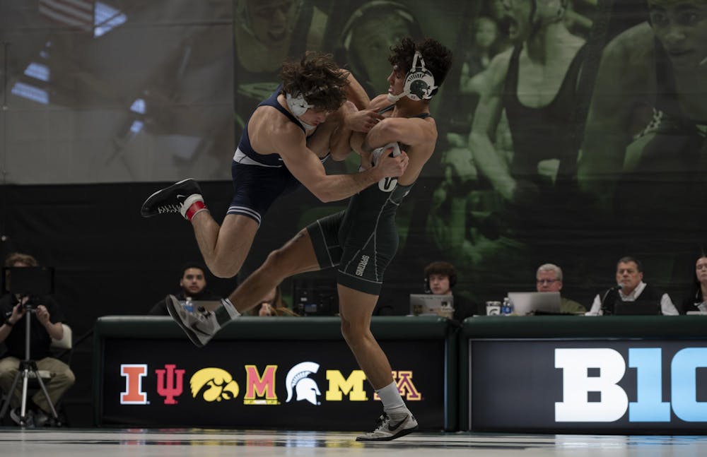 <p>MSU senior Chase Saldate goes against Penn State University's Levi Kasak, the third ranked sophomore from Penn State, during a match at MSU Jenison Field House on Jan. 21, 2024</p>