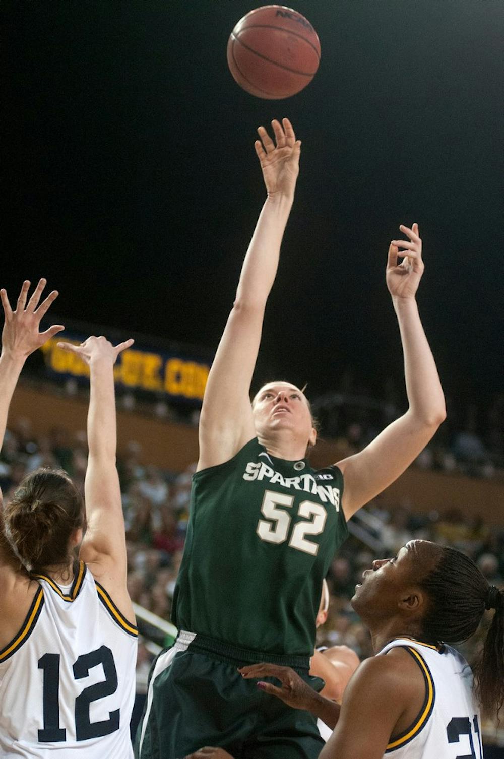 	<p>Sophomore forward Becca Mills shoots Feb. 16, 2013, during a game against Michigan at Crisler Center in Ann Arbor. The Spartans lost 69-70. Julia Nagy/The State News</p>
