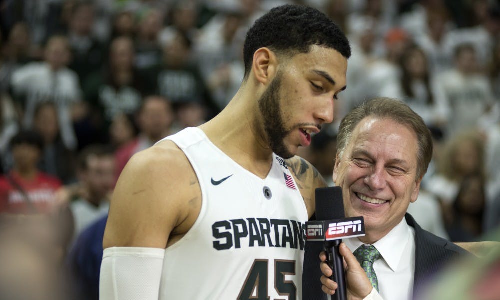 Senior guard Denzel Valentine, left, and head coach Tom Izzo speak to media after the game against Ohio State on March 5, 2016 at Breslin Center. The Spartans defeated the Buckeyes, 91-76.