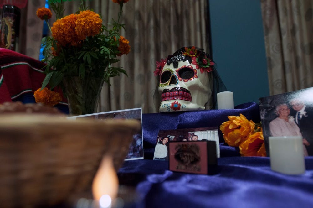 An ofrenda is on display during a Dia de los Muertos event on Nov. 2, 2016 in the Erickson Hall Kiva. Ofrendas are collections of objects placed on a ritual altar to honor and remember the dead. 