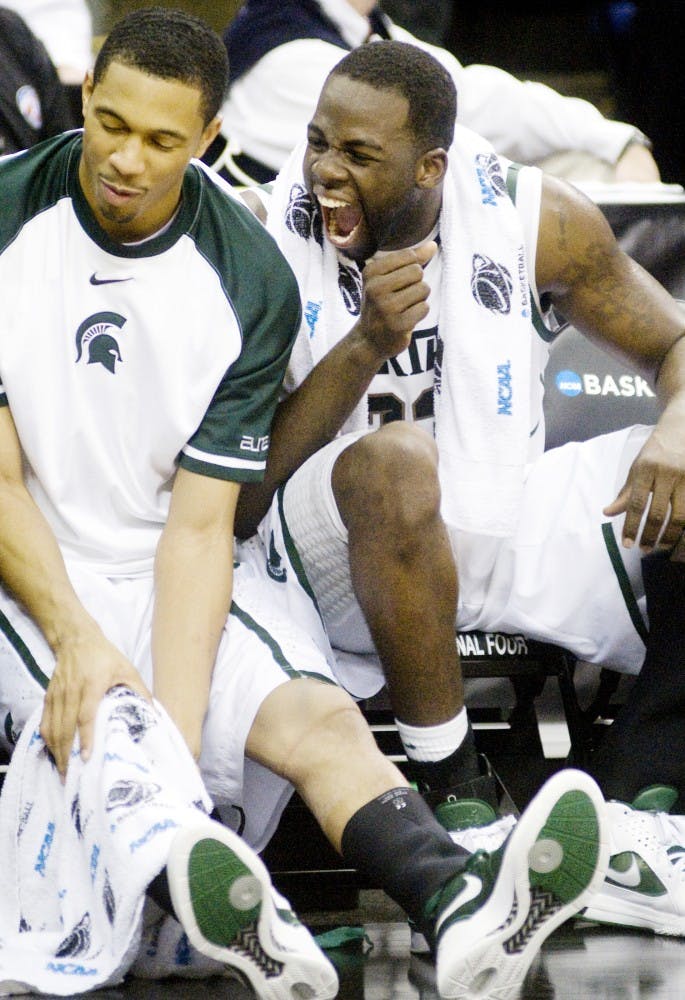 Senior forward Draymond Green celebrates on the bench Friday night at Nationwide Arena, Columbus, Ohio. Green had his third ever triple-doble in the to the 89-67 Spartan victory over Island University Brooklyn. Jaclyn McNeal/The State News