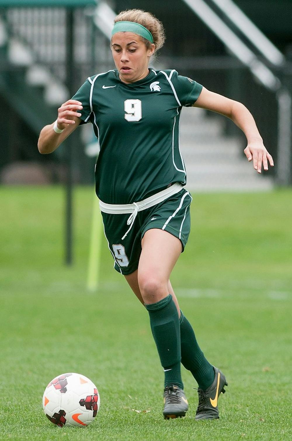 	<p>Freshman midfielder Kaylee Phillips runs after the ball during the game against Wisconsin, Sept. 29, 2013, at DeMartin Stadium at Old College Field. <span class="caps">MSU</span> lost to Wisconsin, 2-0. Danyelle Morrow/The State News</p>