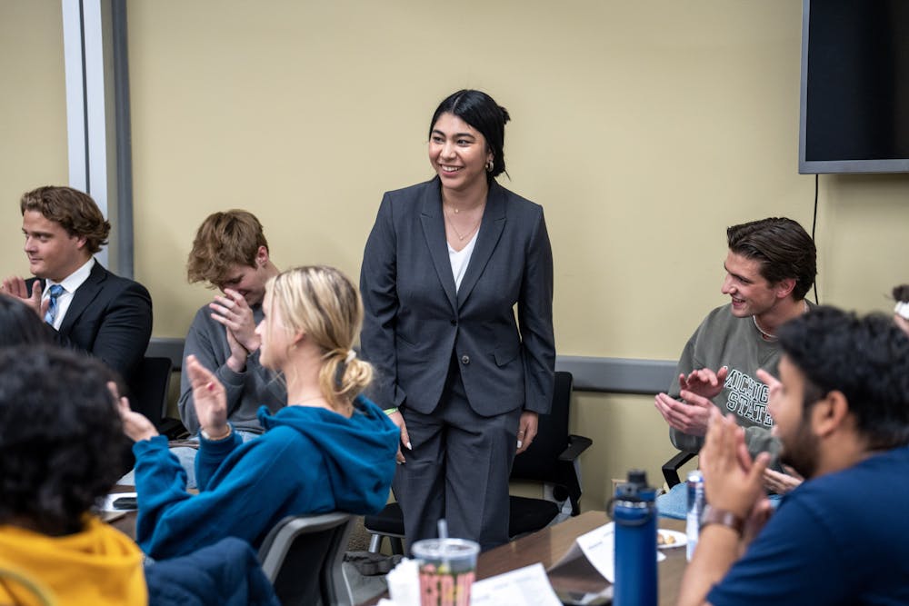 <p>Emily Hoyumpa reacts as she is elected ASMSU's newest President on April 18, 2023.</p>