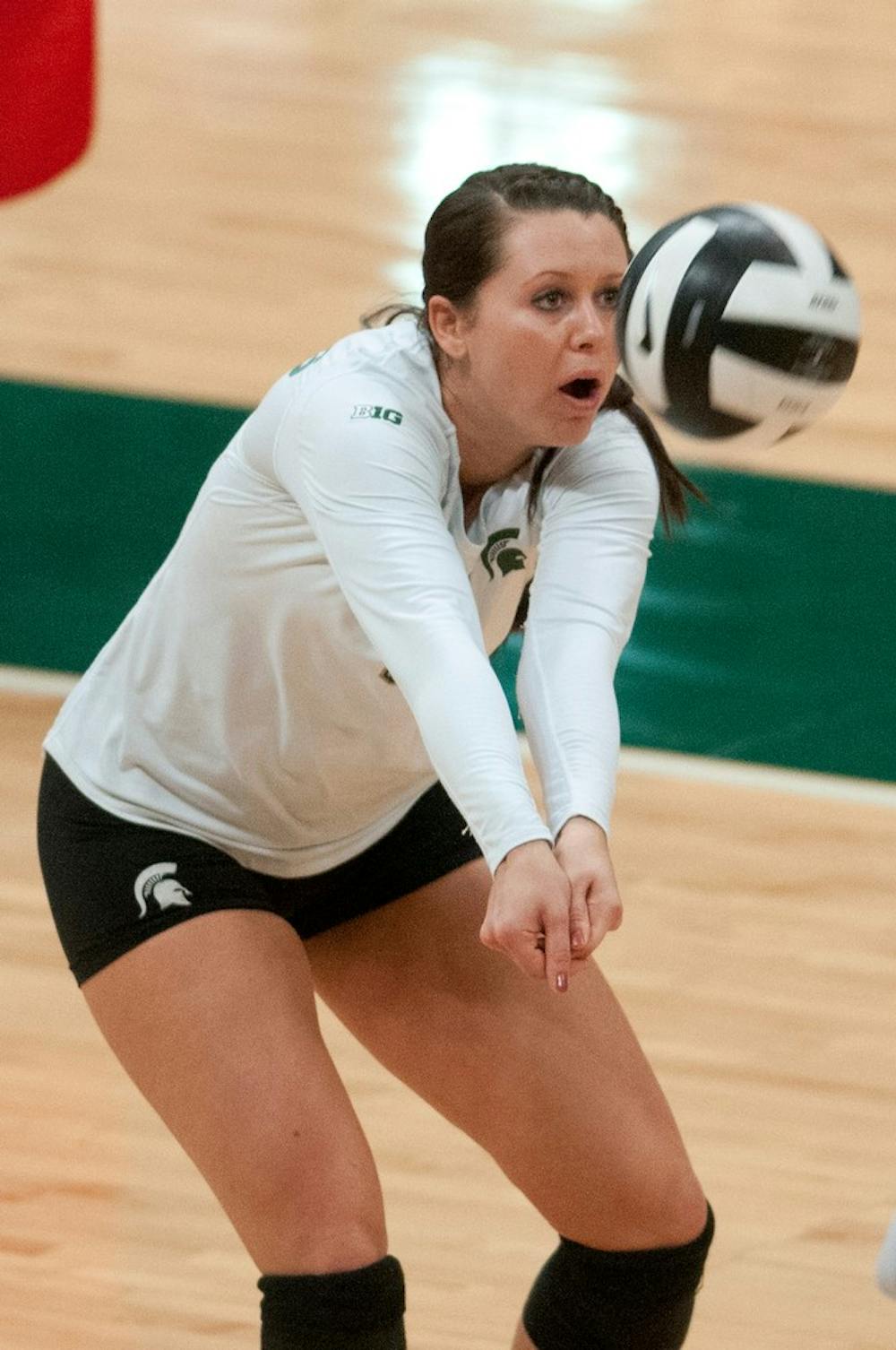 	<p>Junior outside hitter Taylor Galloway bumps the ball Nov. 1, 2013, during the game against Ohio State at Jenison Field House. The Spartans defeated the Buckeyes, 3-0. Julia Nagy/The State News </p>