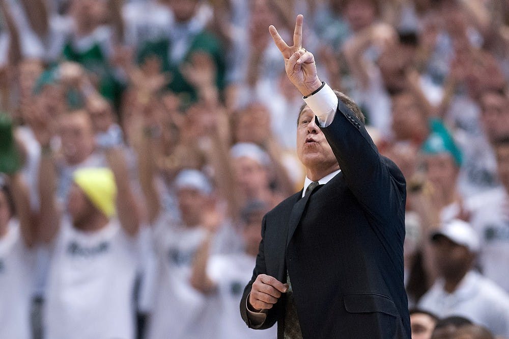 	<p>Head coach Tom Izzo motions to his players during the game against Indiana on Feb. 19, 2013, at Breslin Center. The Hoosiers defeated the Spartans, 72-68. Julia Nagy/The State News</p>