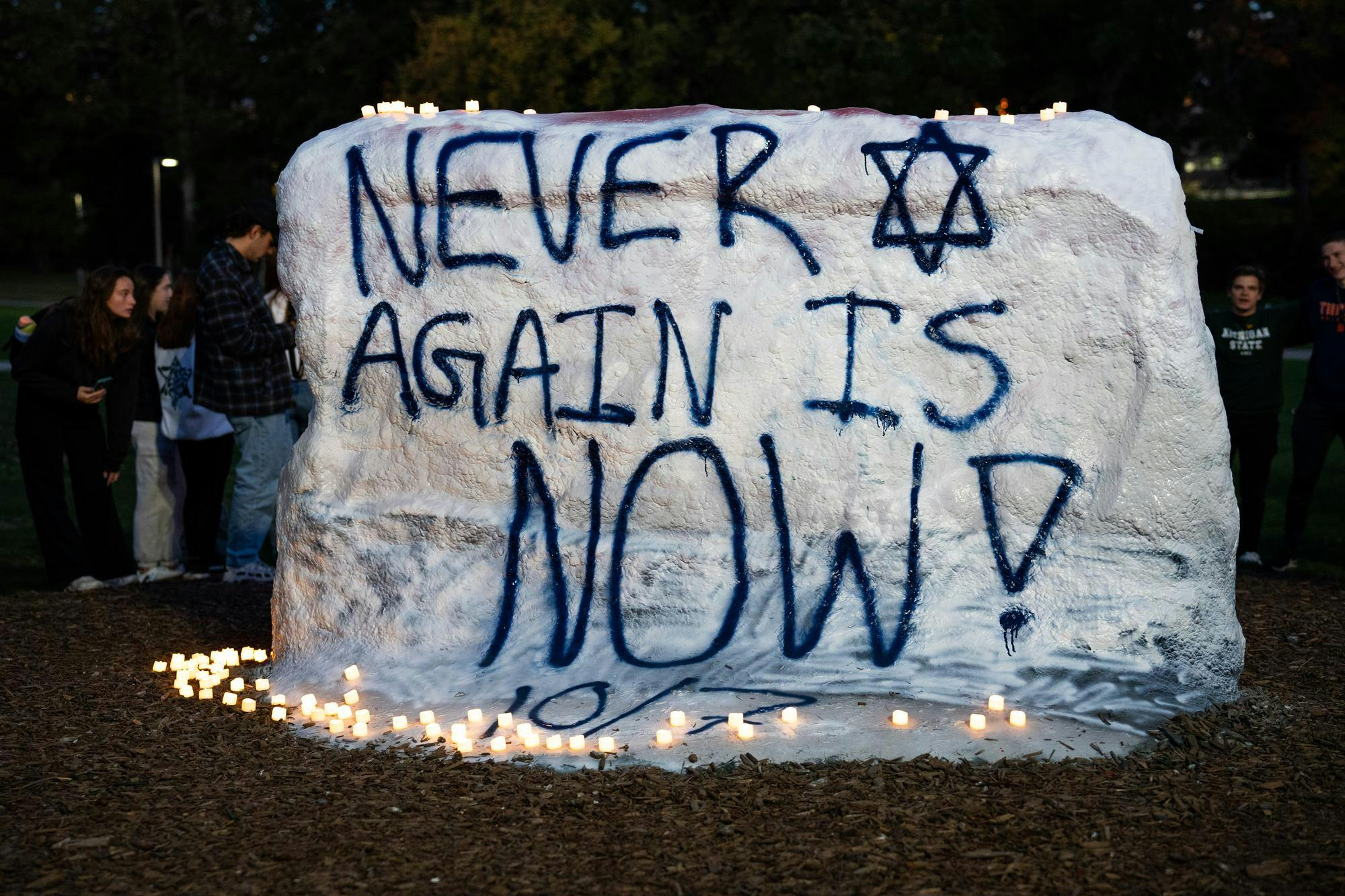 <p>The Rock, painted by a coalition of Jewish student organizations to say "Never again is now!" Photo taken Oct. 7, 2024.</p>