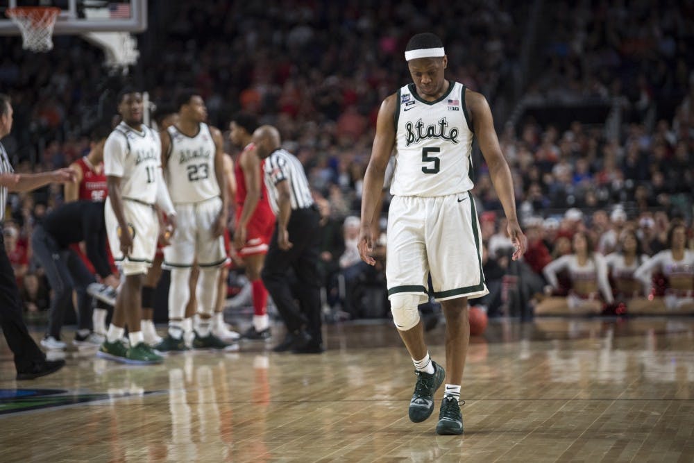 Junior guard Cassius Winston (5) walks on during the second half of the NCAA Final Four game against Texas Tech at U.S. Bank Stadium in Minneapolis on April 6, 2019. The Spartans lost to the Red Raiders 61-51.  (Nic Antaya/The State News)