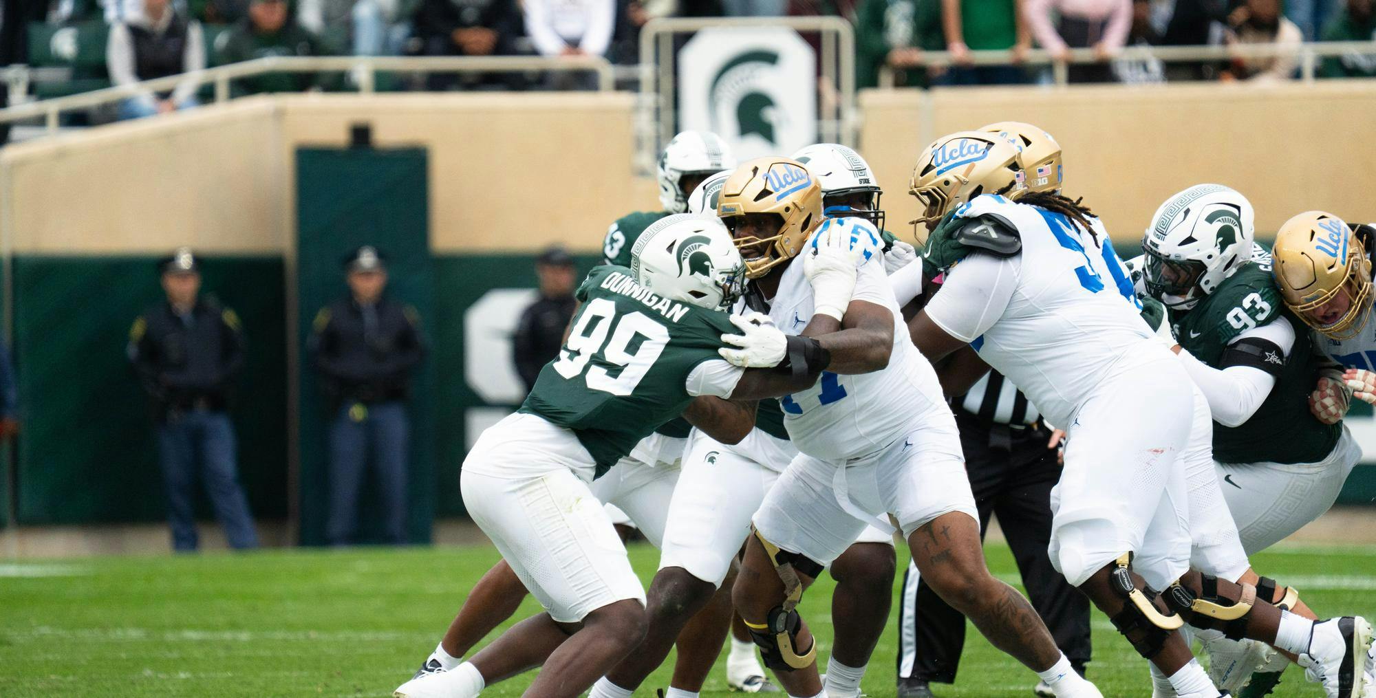 <p>MSU and UCLA tussle during the MSU vs. UCLA game at Spartan Stadium in East Lansing, Michigan on Oct. 11, 2025.</p>