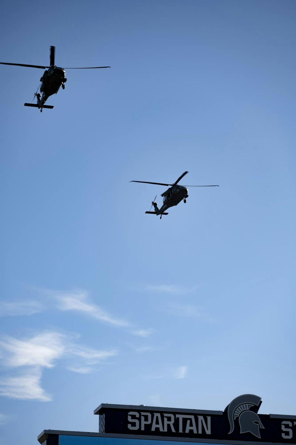 <p>A pair of military helicopters perform a flyover above the scoreboard before kickoff of Michigan State’s game against Nebraska at Spartan Stadium in East Lansing, Mich., on Saturday, Sept. 26, 2026.</p><p><br></p>