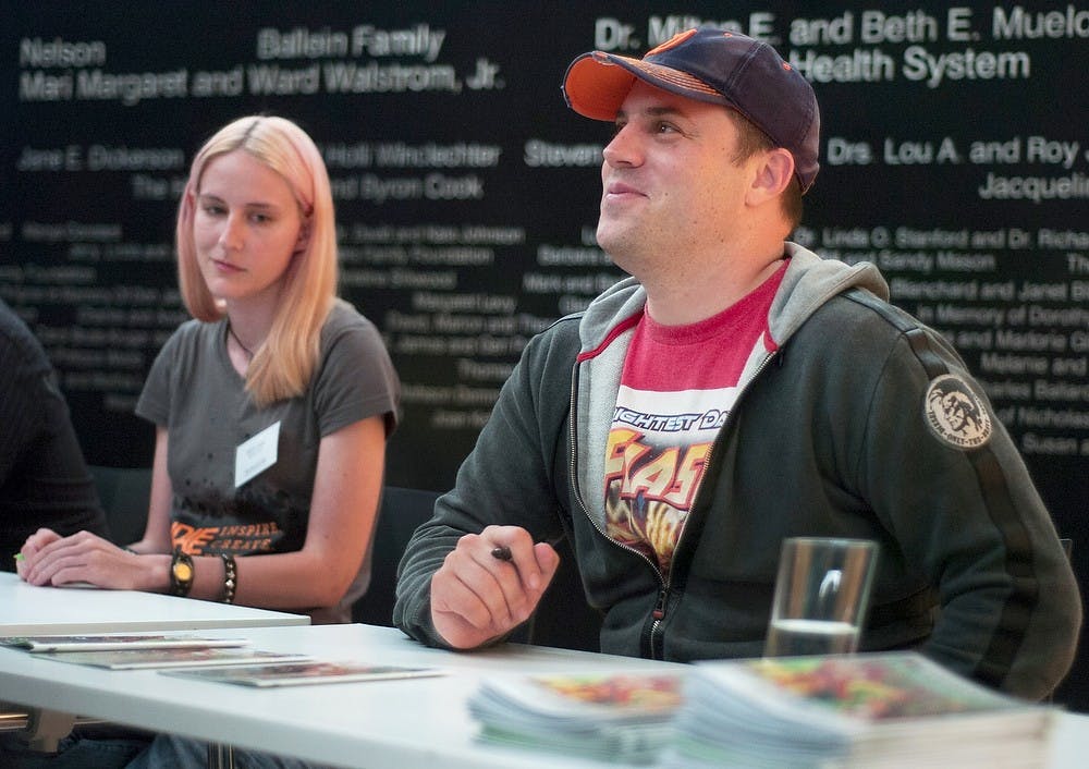 	<p>American comic book writer Geoff Johns greets fans and signs books after his lecture Oct. 9, 2013, at the Eli and Edythe Broad Art Museum. Johns is also an <span class="caps">MSU</span> alumnus and the chief creative officer of DC Comics. Irum Ibrahim/The State News</p>