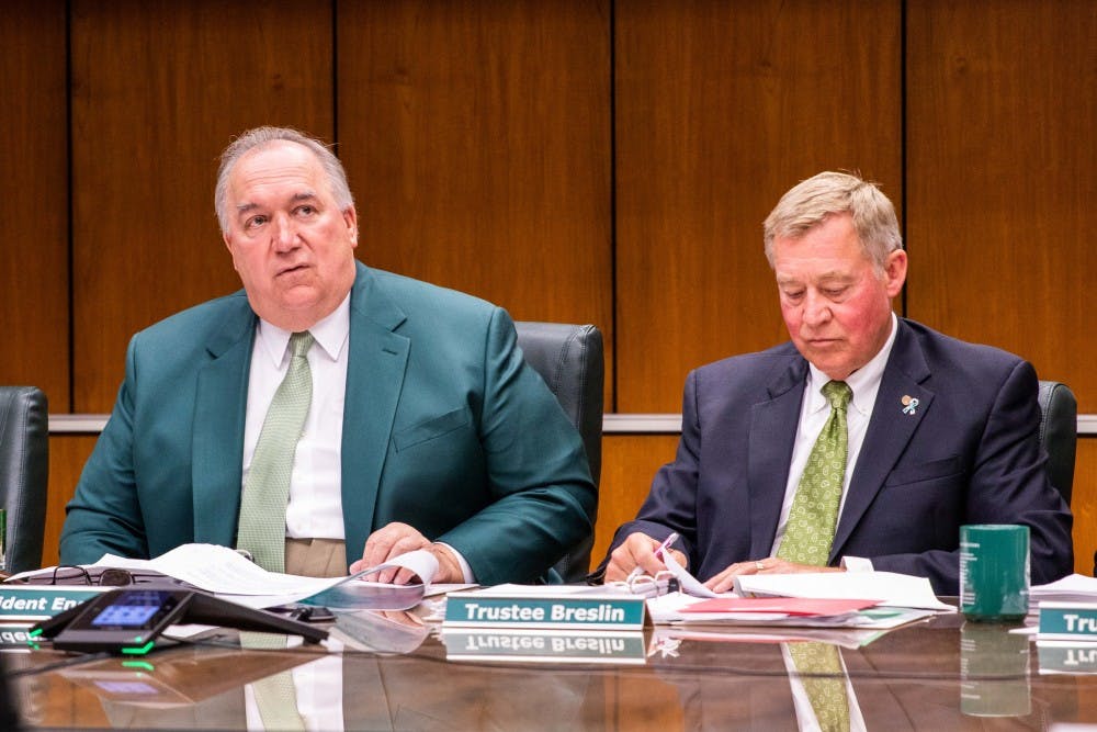 Interim President John Engler (left) speaks during the the Board of Trustees meeting on Aug. 31, 2018 at the Hannah Administration building.