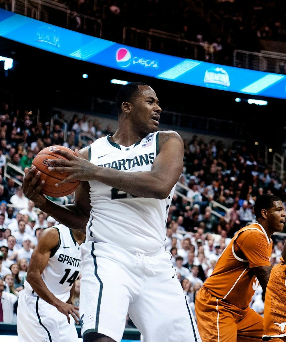 	<p>Senior center Derrick Nix protects the ball against Texas on Saturday, Nov. 22, 2012, at the Breslin Center. Nix scored a total of 25 points throughout the game. Katie Stiefel/ The State News</p>