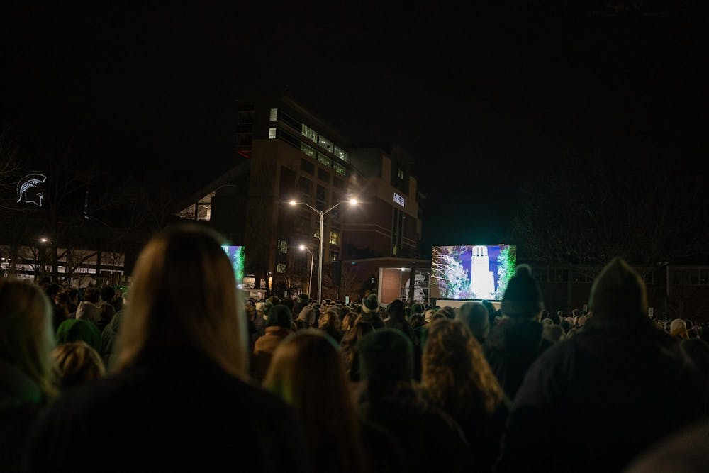 <p>The MSU community listens to the Beaumont Tower bells on Feb. 13, 2024. One year after the Michigan State University campus shooting, a remembrance ceremony was held to remember and reflect on the tragedy.</p>