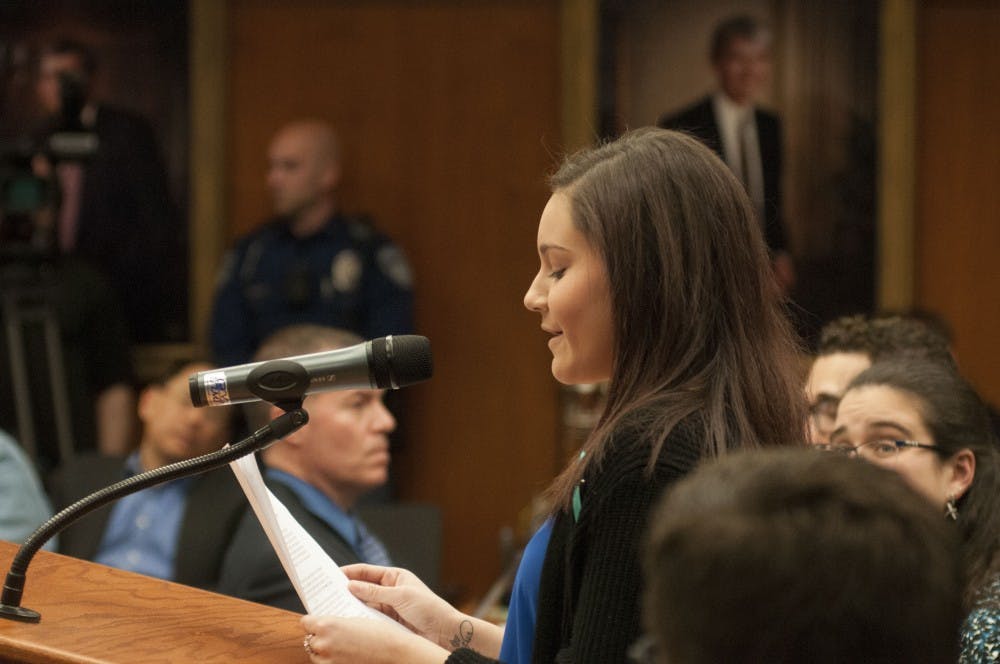 Survivor Kaylee Lorincz speaks during the Board of Trustees meeting on April 13, 2018 at Hannah Administration Building. (C.J. Weiss | The State News)
