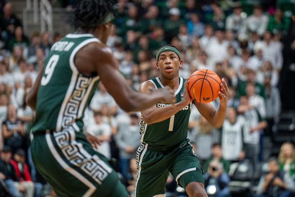 <p>MSU's guard and redshirt sophomore Jeremy Fears Jr. (1) prepares to pass to guard Trey Fort (9) at the Breslin Center in East Lansing, Michigan on Thursday, Nov. 13, 2025.</p>