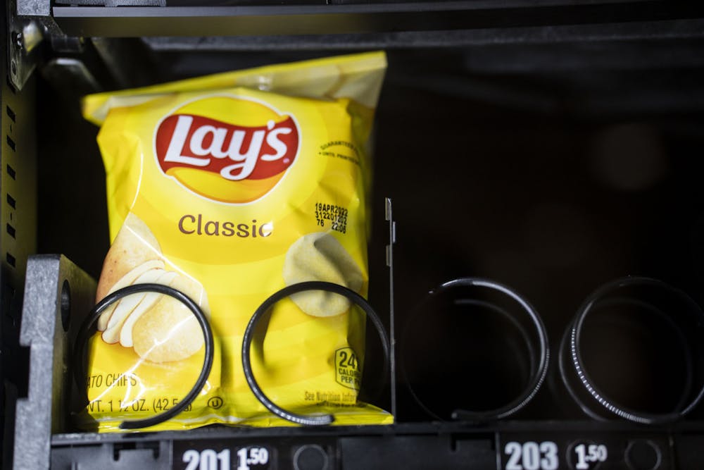 <p>A vending machine filled with multi-layer plastic packaging, such as this chip bag, at the Communications Arts and Sciences Building on MSU&#x27;s campus on Feb. 22, 2022.</p>