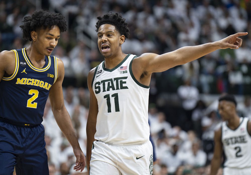 <p>Junior guard A.J. Hoggard (11) communicates with the team during Michigan State’s game against Michigan on Saturday, Jan. 7, 2023 at the Breslin Center. The Spartans ultimately beat the Wolverines, 59-53.</p>