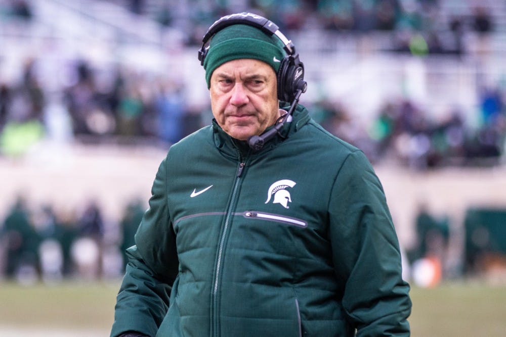 Football head coach Mark Dantonio stands by the sideline during the game against Ohio State Nov. 10, 2018. The Spartans fell to the Buckeyes, 26-6.