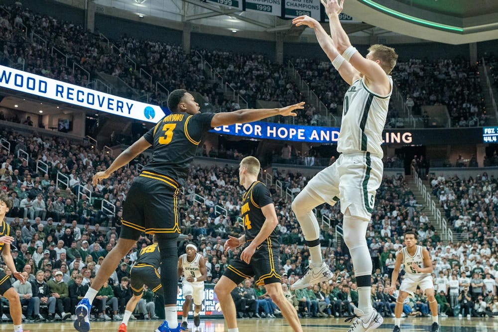 <p>Senior forward Jaxon Kohler (0) goes up for a shot during the matchup against the University of Iowa at the Breslin Center on Dec. 2, 2025.</p>