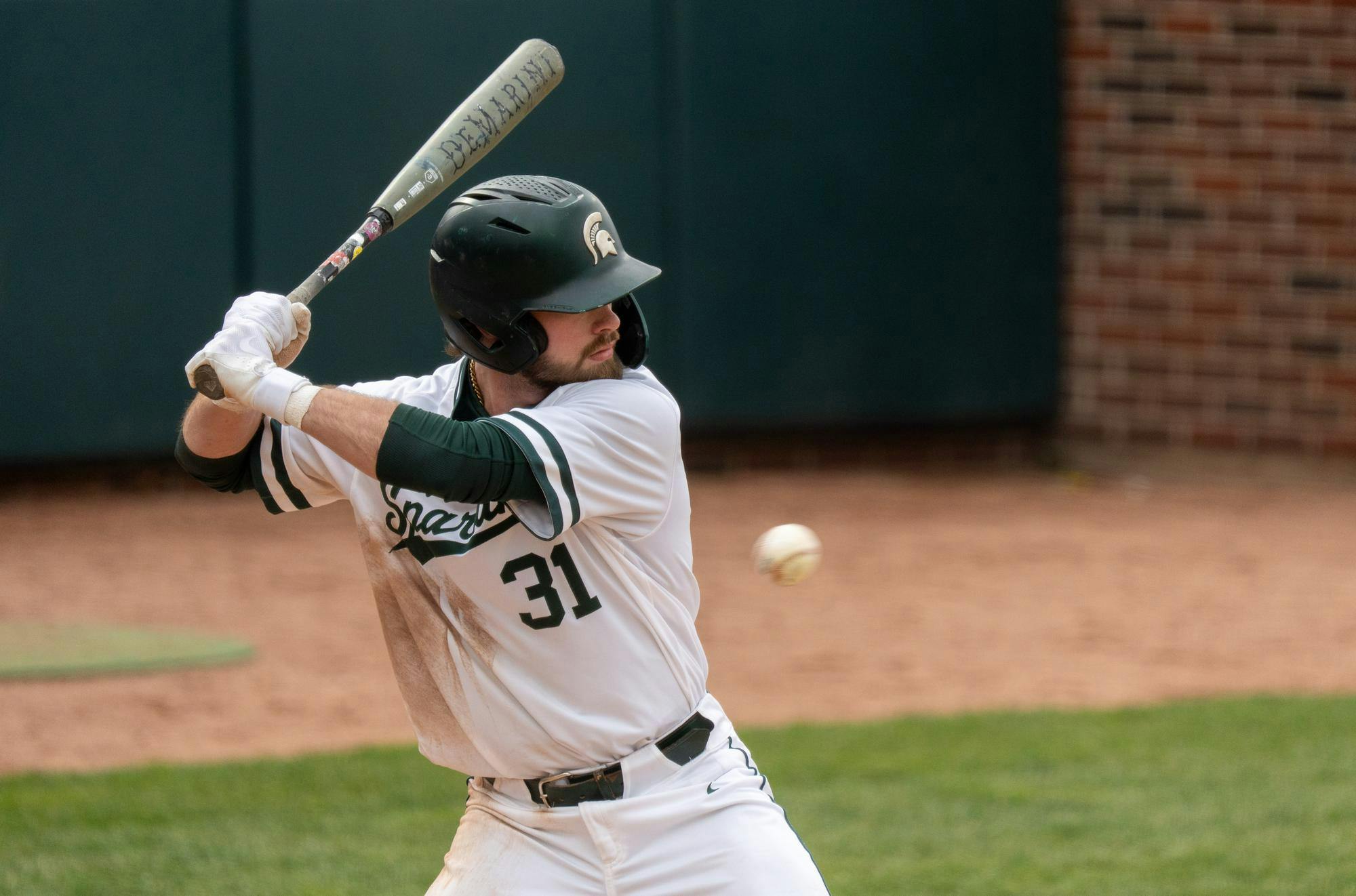 <p>Michigan State graduate catcher Caleb Berry (31) lets the ball fly past him at McLane Stadium on April 19, 2025.</p>
