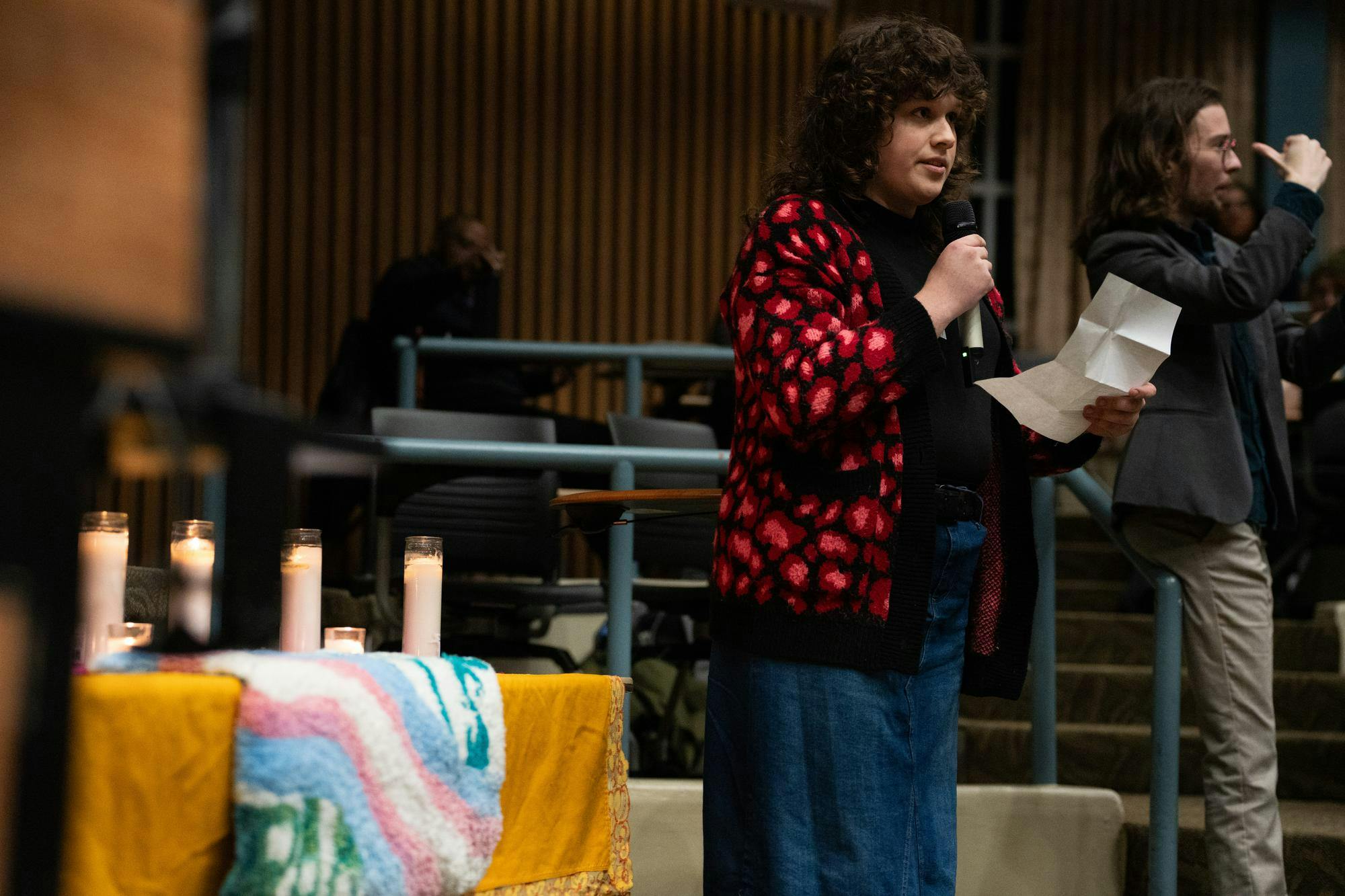 <p>ichigan State international relations junior Lyra Opalikhin reads a poem titled "Our Stardust" during the university's Transgender Day of Remembrance event at Erickson Hall on Nov. 20, 2024. The annual observance honors the memory of people whose lives were lost in acts of anti-transgender violence.</p>