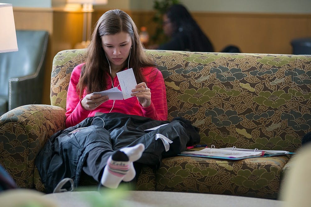 <p>Prenursing freshman Bridget Kutsche studies Feb. 21, 2015, in the women's lounge at the MSU Union. The women's lounge is Kutsche's preferred place to study for the quiet atmosphere.</p>