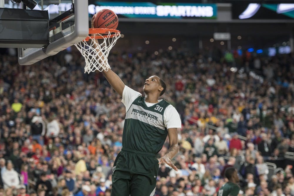 <p>Then-freshman forward Marcus Bingham Jr. (30) shoots a layup during Michigan State&#x27;s NCAA Men&#x27;s Basketball Final Four open practice at U.S. Bank Stadium in Minneapolis on April 5, 2019. (Nic Antaya/The State News)</p>